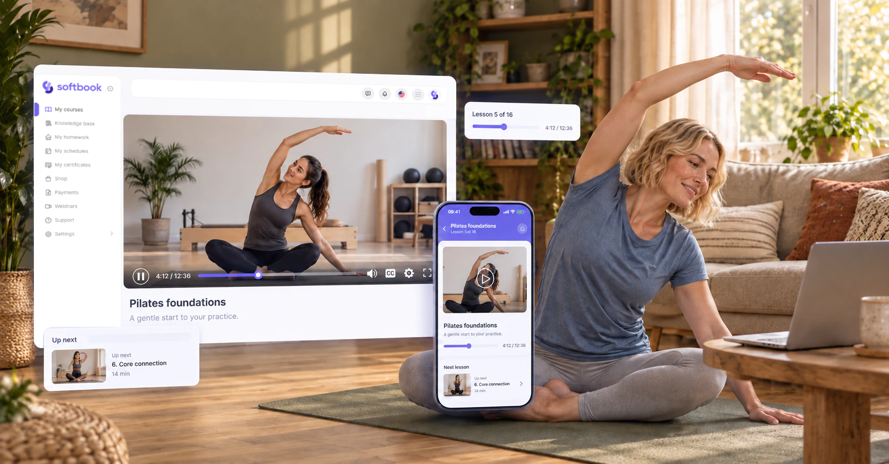 A woman doing pilates at home, next to her a course lesson in the browser and the same lesson in the Softbook app on a phone